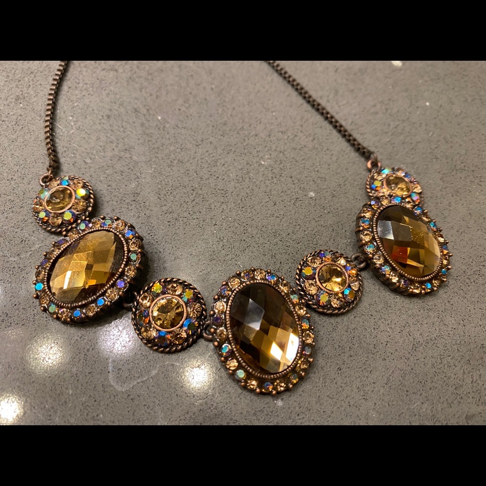 Cache matching earrings, bracelet, and necklace